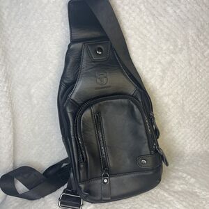 BULLCAPTAIN Black Leather Sling Bag Crossbody Shoulder Travel Headphones USB